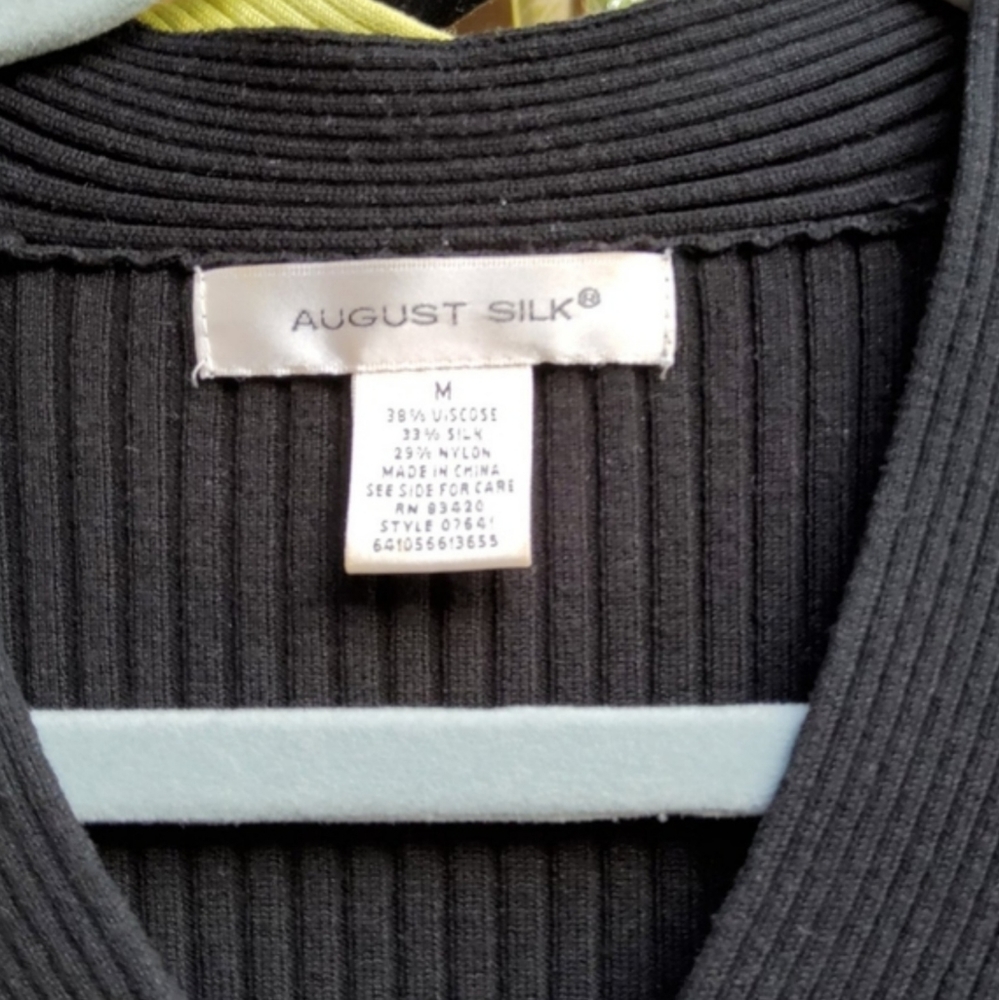 August Silk Faux wrap ribbed knit blouse in BLACK